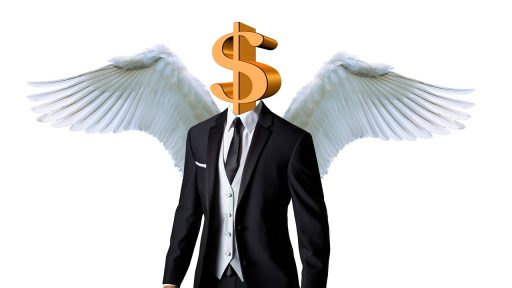 Ondernemer die financiële grafieken en cijfers bestudeert achter een laptop